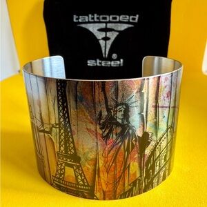 Tattooed Steel Multicolor Cuff Bracelet “Travel Channel”